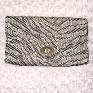 HM Black and Tan straw clutch with gold closure